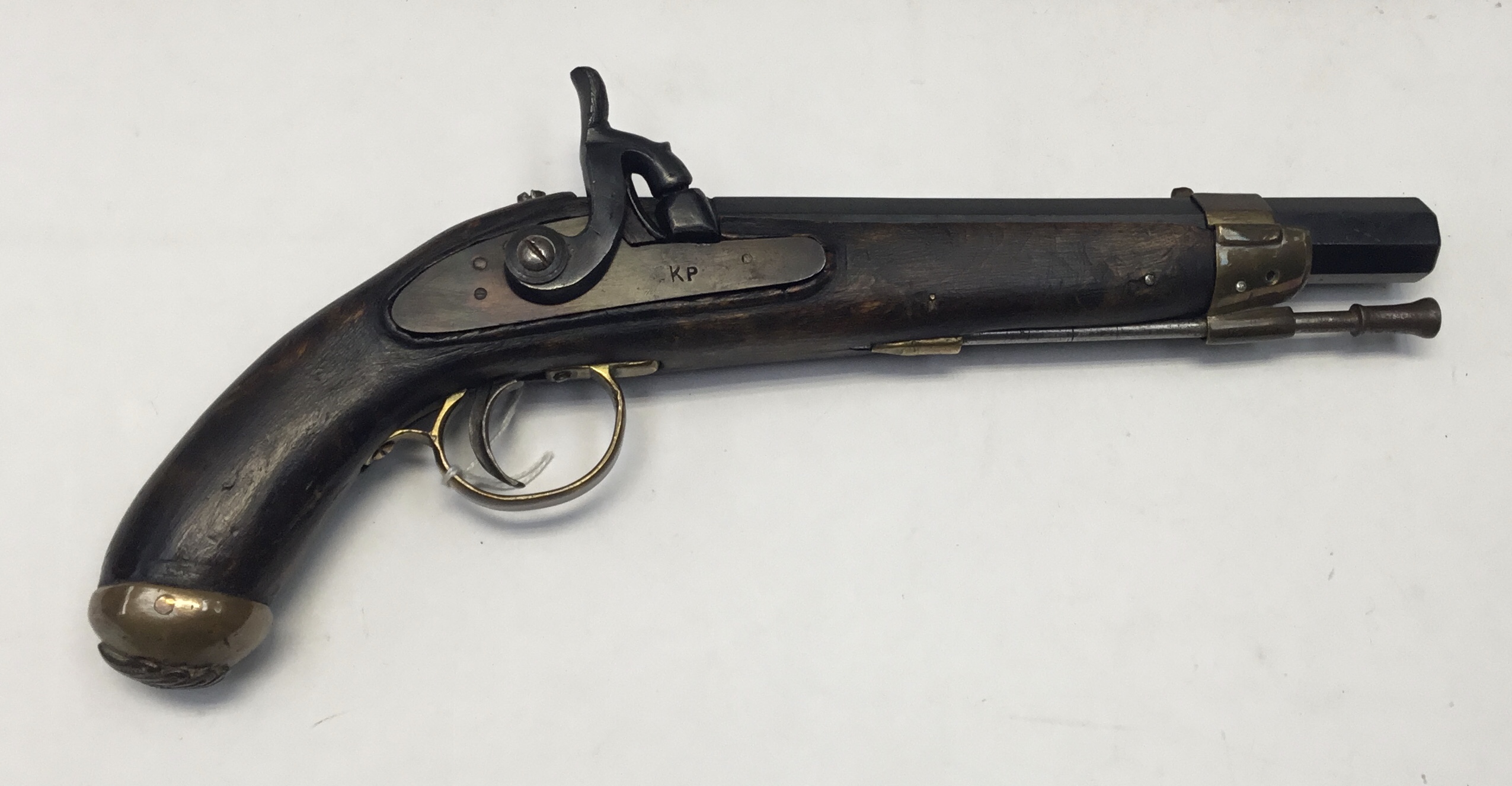 A Mid 19th century style single barrel percussion pistol. Overall length 14” with 9” blued octagonal