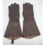 A matched pair of 1940 dated, WW2 era 1933 pattern RAF leather gauntlets. Both with correct zips