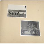 An interesting WW2 German photograph album, containing over 140 snapshot photographs taken by a