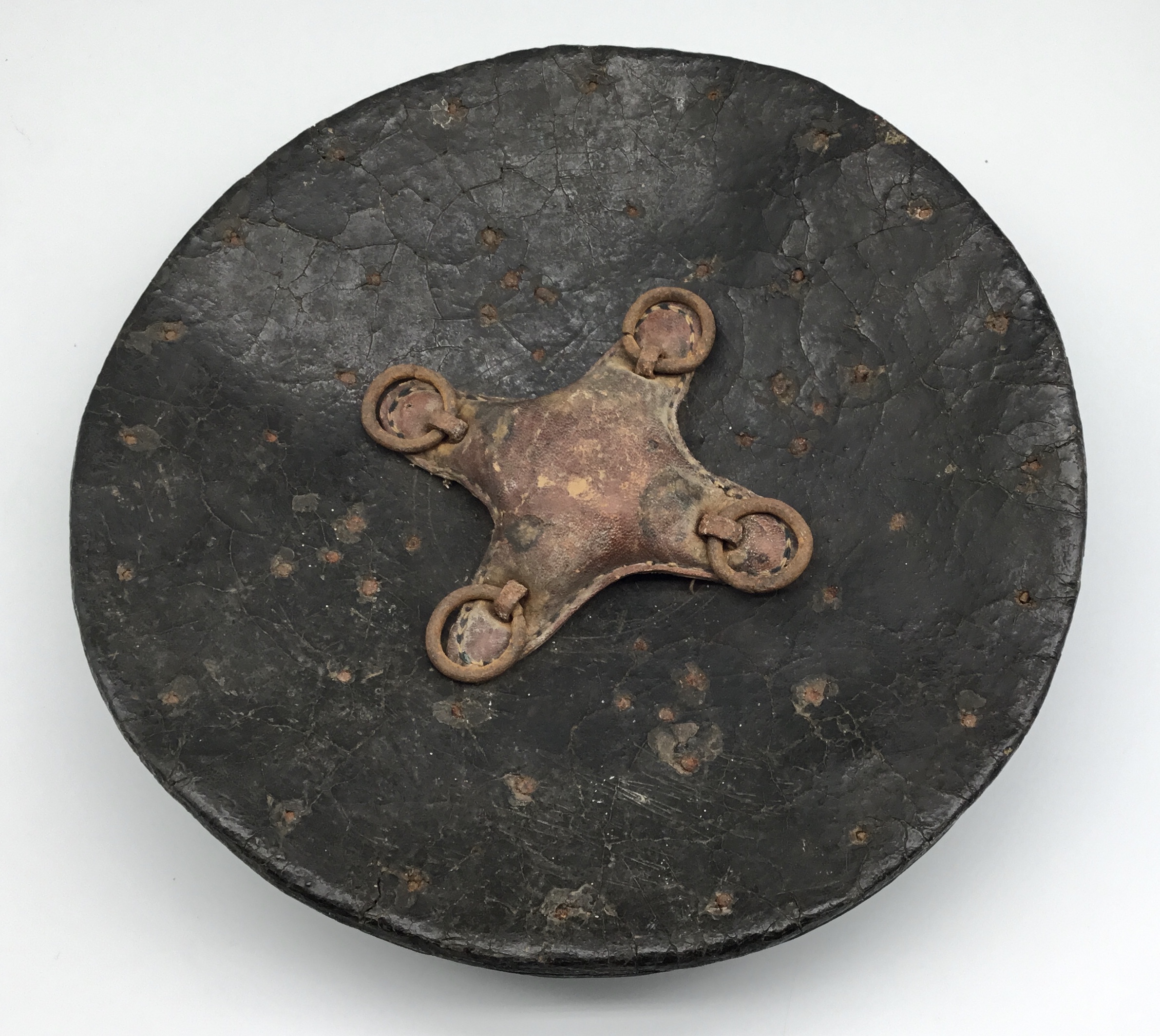 A late 19th century Indo-Persian Dhal or parrying shield. Thick hide construction and of slightly - Image 6 of 8