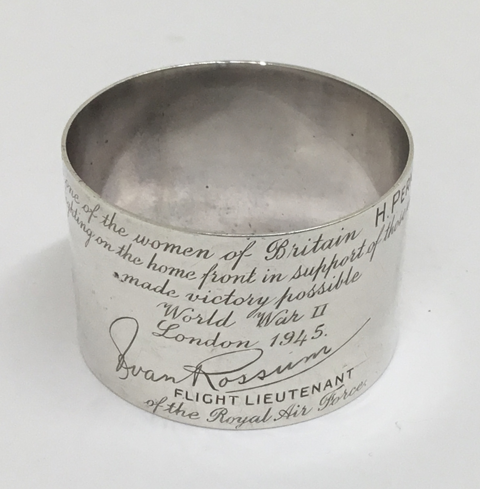 An unusual WW2 era R.A.F related sterling silver napkin ring, apparently gifted by a Flight