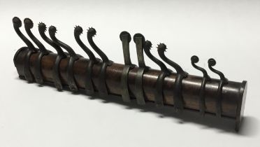 A scarce 19th century military spur shop display piece, containing 6 matched pairs of steel boot