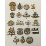 A quantity of WW1, WW2 and some later British regimental cap badges. To include: examples for the