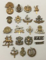 A quantity of WW1, WW2 and some later British regimental cap badges. To include: examples for the