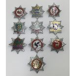 A selection of vintage chromed and enamelled fire service cap badges. To include: Nottinghamshire,