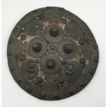 A late 19th century Indo-Persian Dhal or parrying shield. Thick hide construction and of slightly