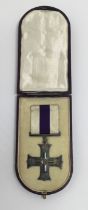 A WW1 Military Cross, in an original maroon leather fitted case. Correct stepped suspension bar, and