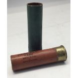 One unfired pre-war 4bore Eley gastight quality paper-case metal-lined shotgun cartridge in red