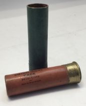 One unfired pre-war 4bore Eley gastight quality paper-case metal-lined shotgun cartridge in red