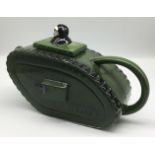 A rare 1970’s Richard Parrington World War I tank teapot. Based on the Mark 1 British tank, designed