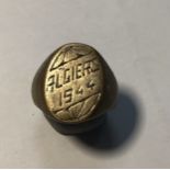 WW2 Trench Art Ring, engraved with the word ‘Algiers 1944 & stylised flowers’ Scratch made by a