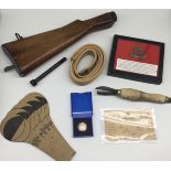 A selection of WW1 / WW2 military related items. To include: a Lee Enfield rifle stock, with