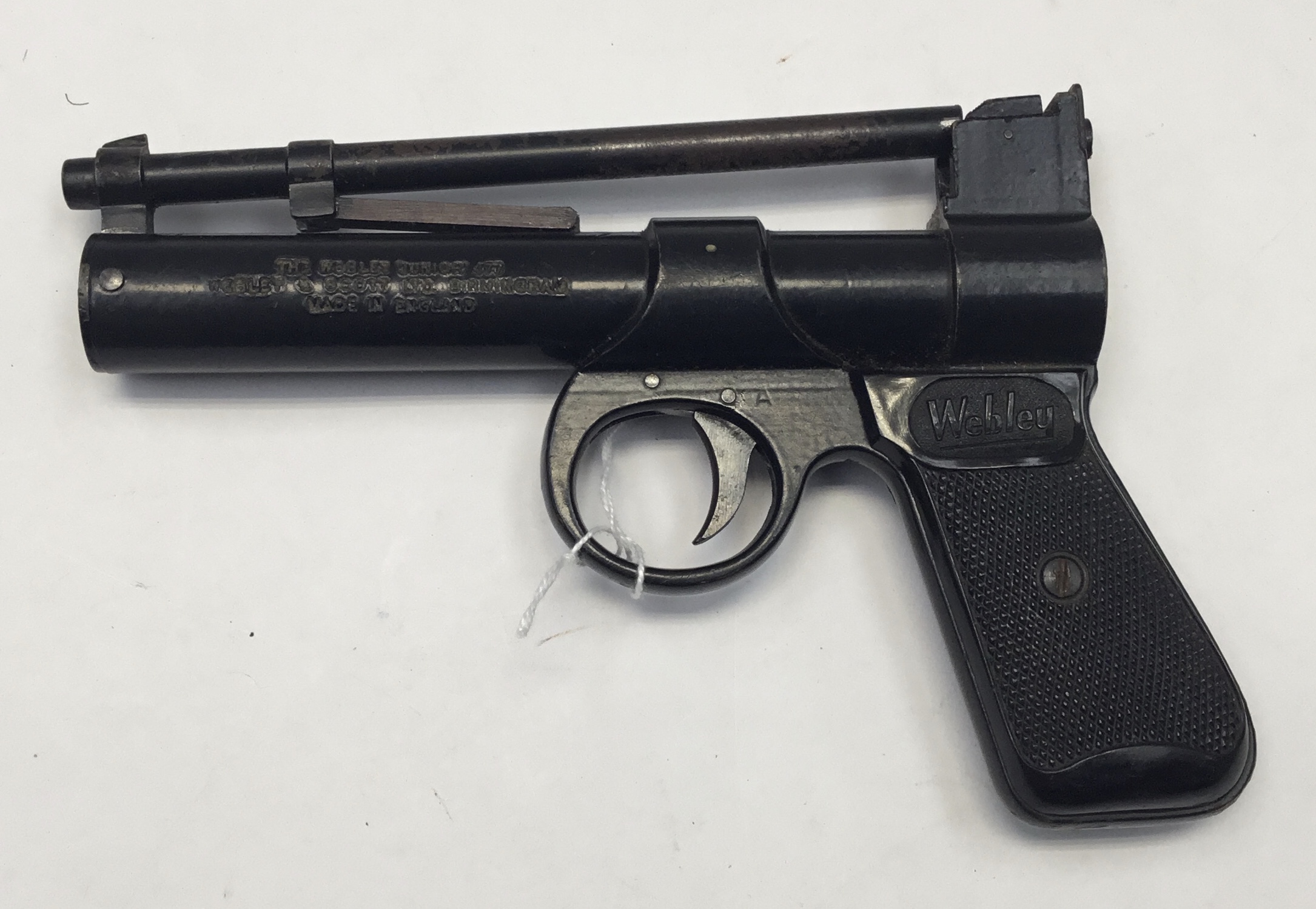 Webley Junior over-lever air pistol in .177 smooth bore. A good example in tidy condition and
