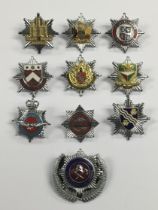 A good selection of vintage chromed and enamelled fire service cap badges. To include: Royal Air