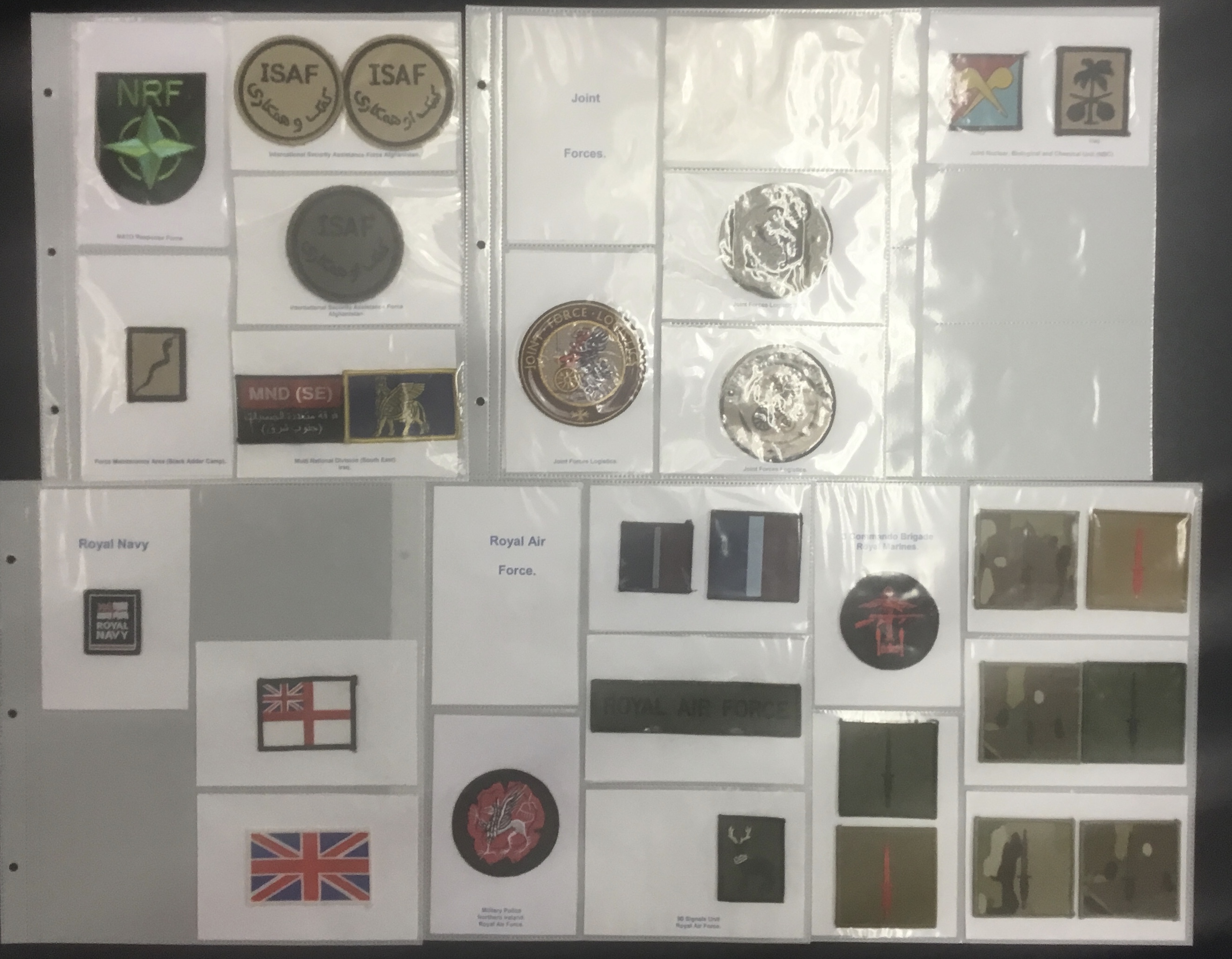 A selection of modern embroidered military patches, representing various countries. To include: NATO
