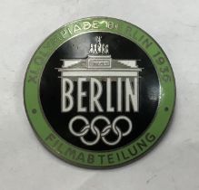 A Very Rare 1936 Berlin Olympics Film Crew enamel badge. Only given to international film crews to