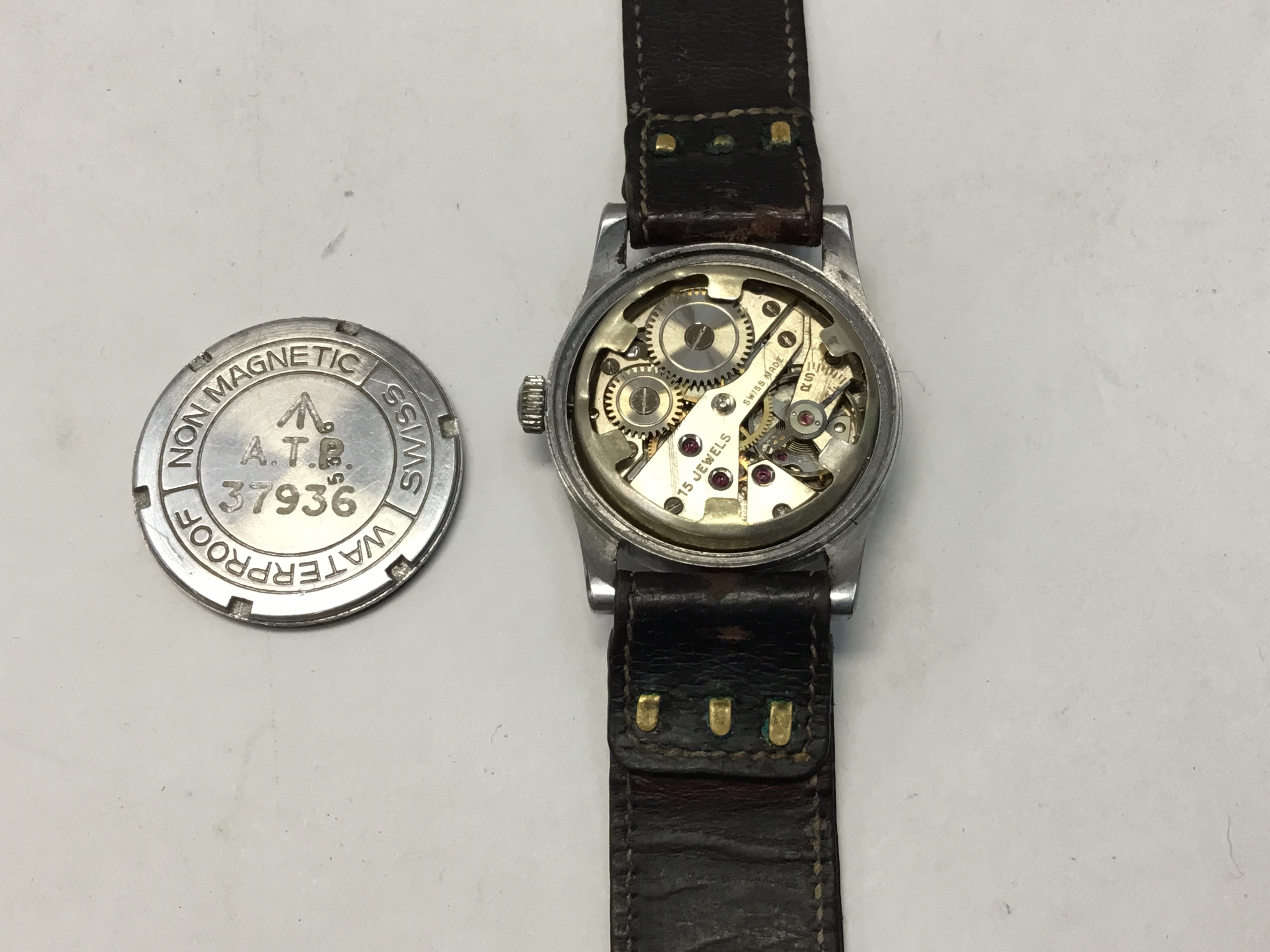 A Swiss gents ‘GMT’ 1940's 15 jewels GMT military wristwatch, comprising a signed silvered round