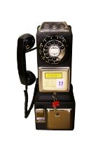 An Automatic Electric Company Coin Operated Telephone. Code Number LPC-89-55. Made in America, North