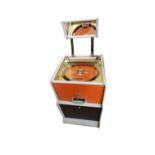 Bryans Works Penny Go Round 1968 Circular Coin Pusher Machine. The Penny-Go-Round is a rare and