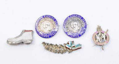 A small collection of silver badges to include; two the same commemorating Nottingham Evening