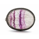 A small oval Blue john fluorite white metal mounted brooch, length approx 22mm, pin and C clasp