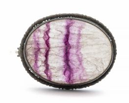 A small oval Blue john fluorite white metal mounted brooch, length approx 22mm, pin and C clasp