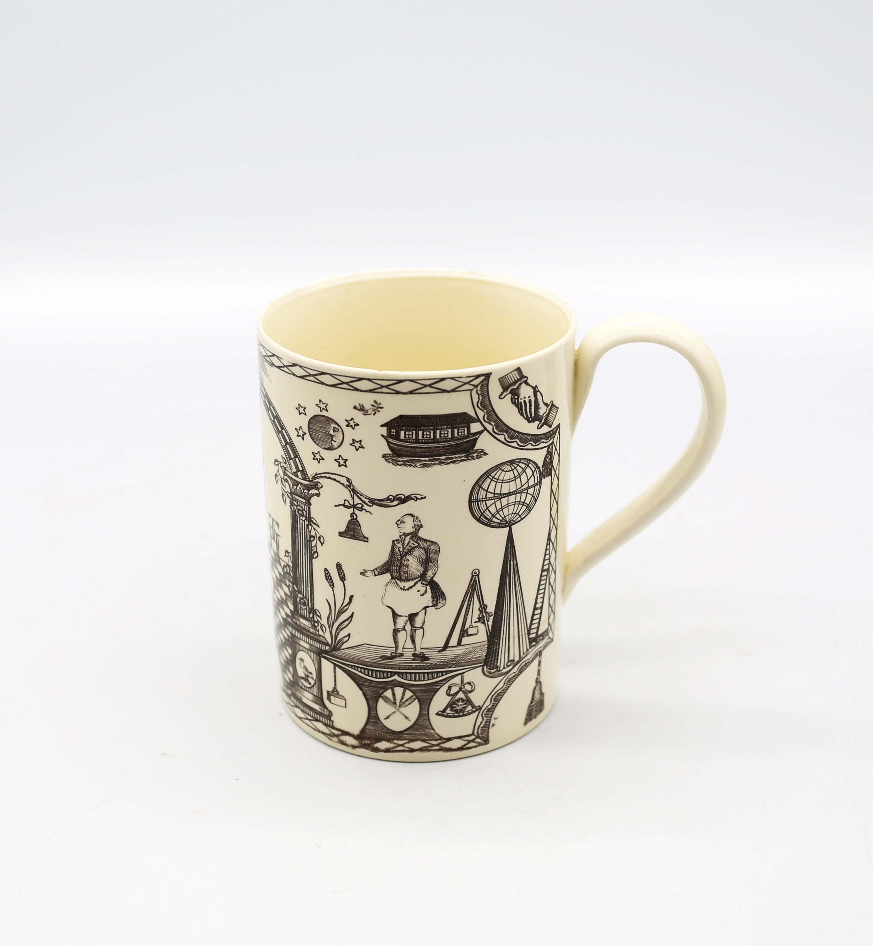 A small Leeds creamware mug with Masonic engravings.  Circa 1780-1800. Size 9.5cm high  Condition.