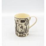 A small Leeds creamware mug with Masonic engravings.  Circa 1780-1800. Size 9.5cm high  Condition.