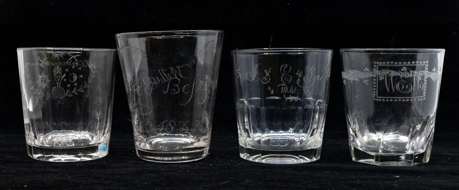 A collection of early to mid 19th Century glass tumblers with etched detail to bowls.