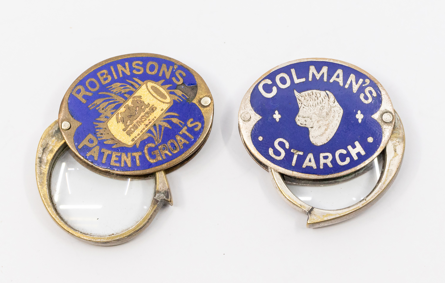 A novelty base metal and enamel advertising pocket folding eye glass for Colman's Starch/Mustard,