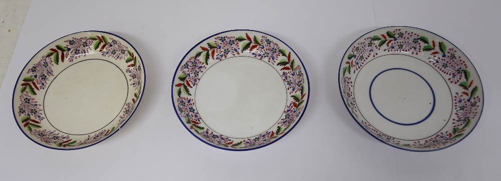 Small collection of Staffordshire pearlware cups and saucers and a tea bowl, decorated with bands of - Image 2 of 7