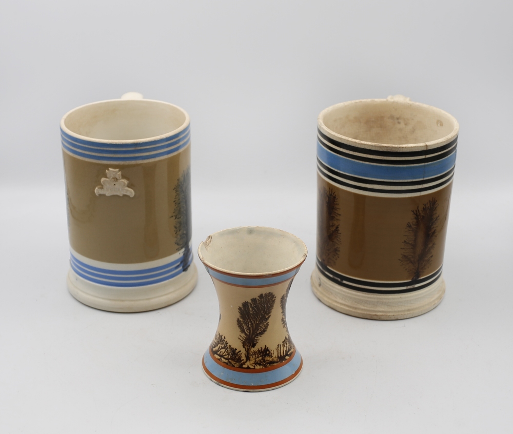 A Mocha ware Quart sized mug, mid brown ground with feathered sepia trees, blue band and six black - Image 4 of 6