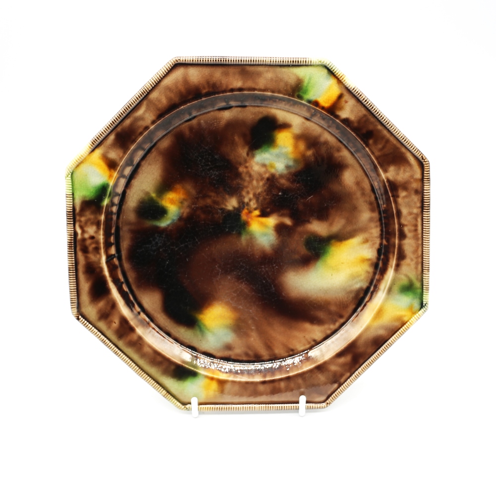 A Staffordshire octagonal Whieldon plate, sponge decorated in brown, green and yellow.  Circa