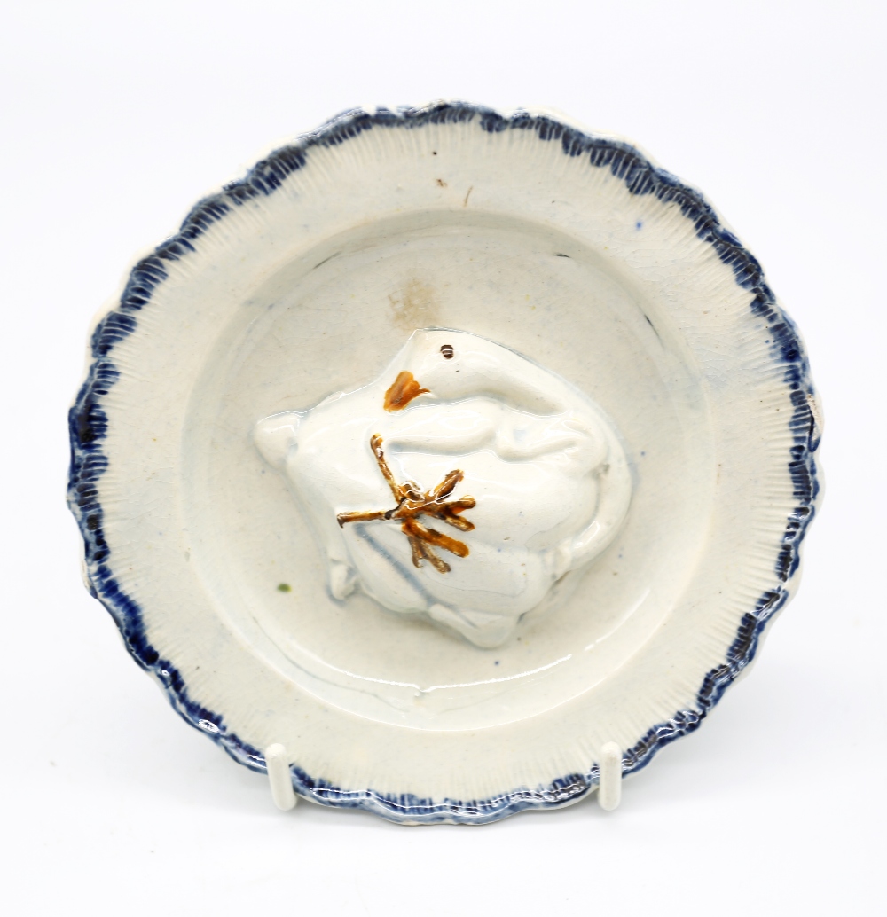 A pearlware ‘Toy’ round plate with a goose moulded in the centre with a blue feathered border. - Image 2 of 12