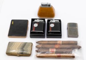 A collection of mixed lighters and other smoking  ephemera to include; two Ronson 'Vanguard' black