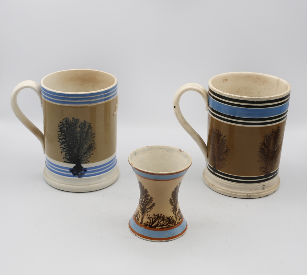 A Mocha ware Quart sized mug, mid brown ground with feathered sepia trees, blue band and six black - Image 3 of 6