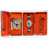 Ingersoll- a Mickey mouse automation wristwatch, with decorative metal strap, in original case