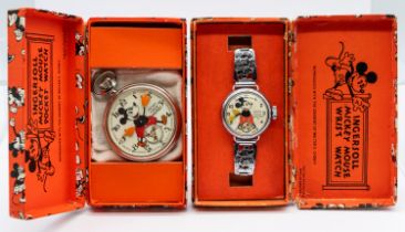 Ingersoll- a Mickey mouse automation wristwatch, with decorative metal strap, in original case