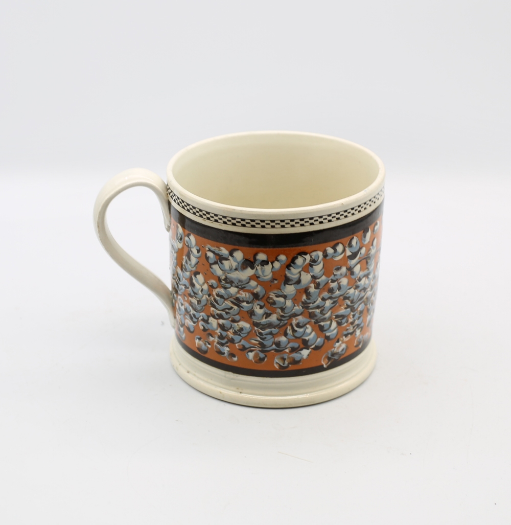 A large creamware mug, orange ground with a spattered finger trail design with  black  borders to - Image 3 of 8