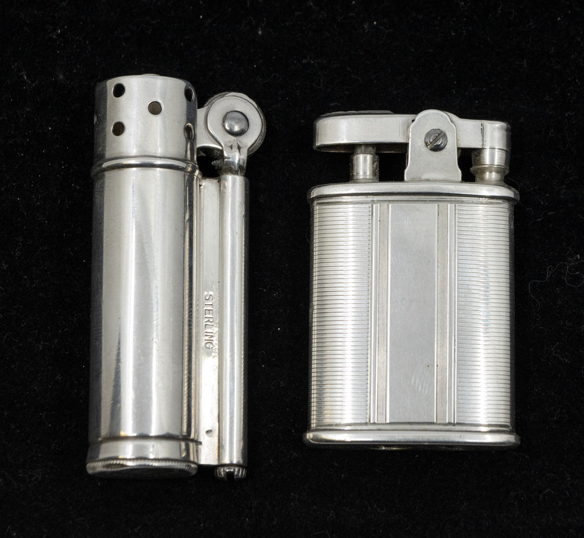 A sterling silver Dunhill service lighter of cylindrical form, marked to base and marked sterling to - Bild 2 aus 3