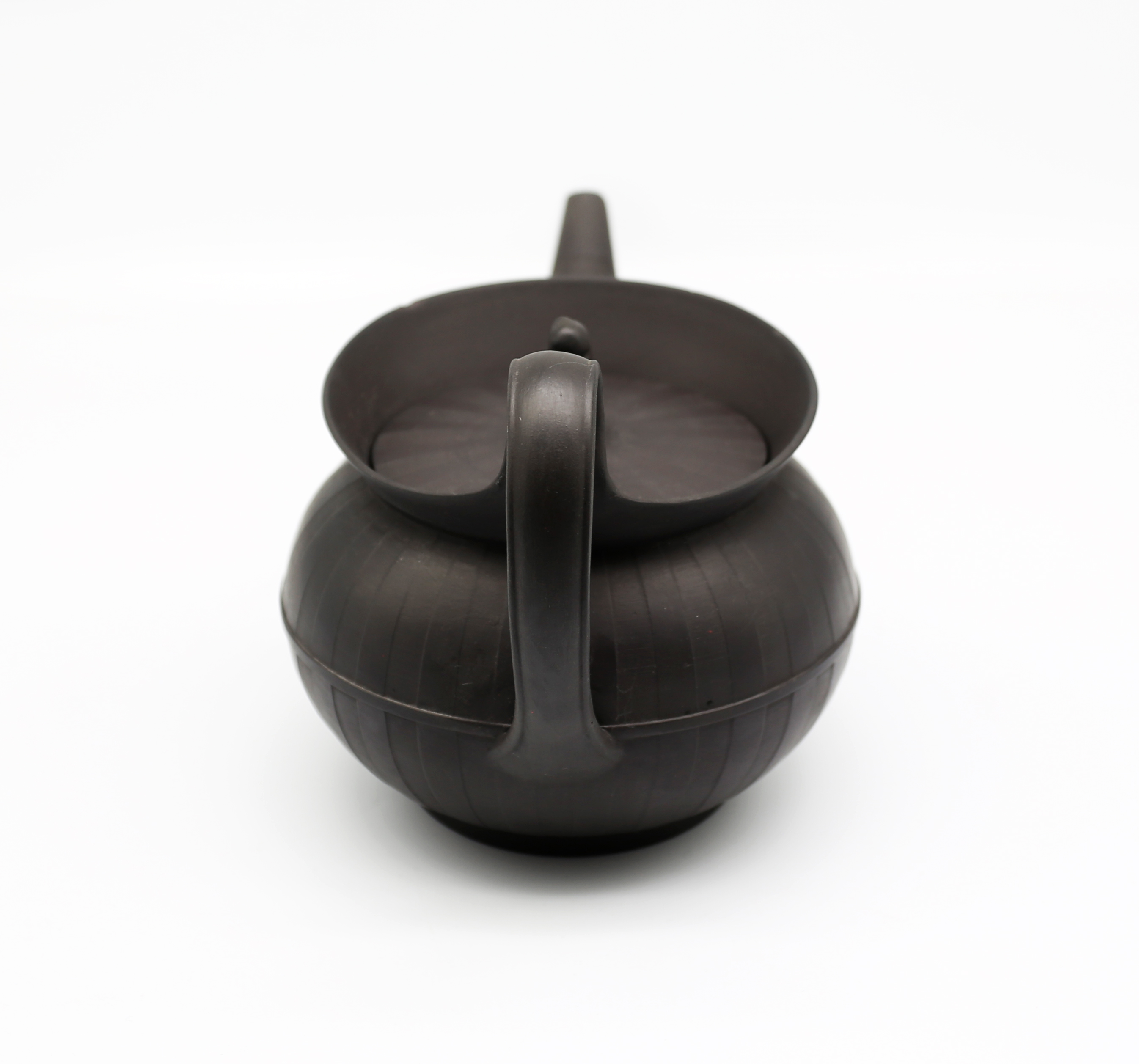 A Wedgwood black basalt teapot and cover with a flared lip.  The cover has a widow finial. - Image 2 of 16