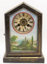 An early 20th century Union Clock Company wooden cased mantel clock, front hinged door with