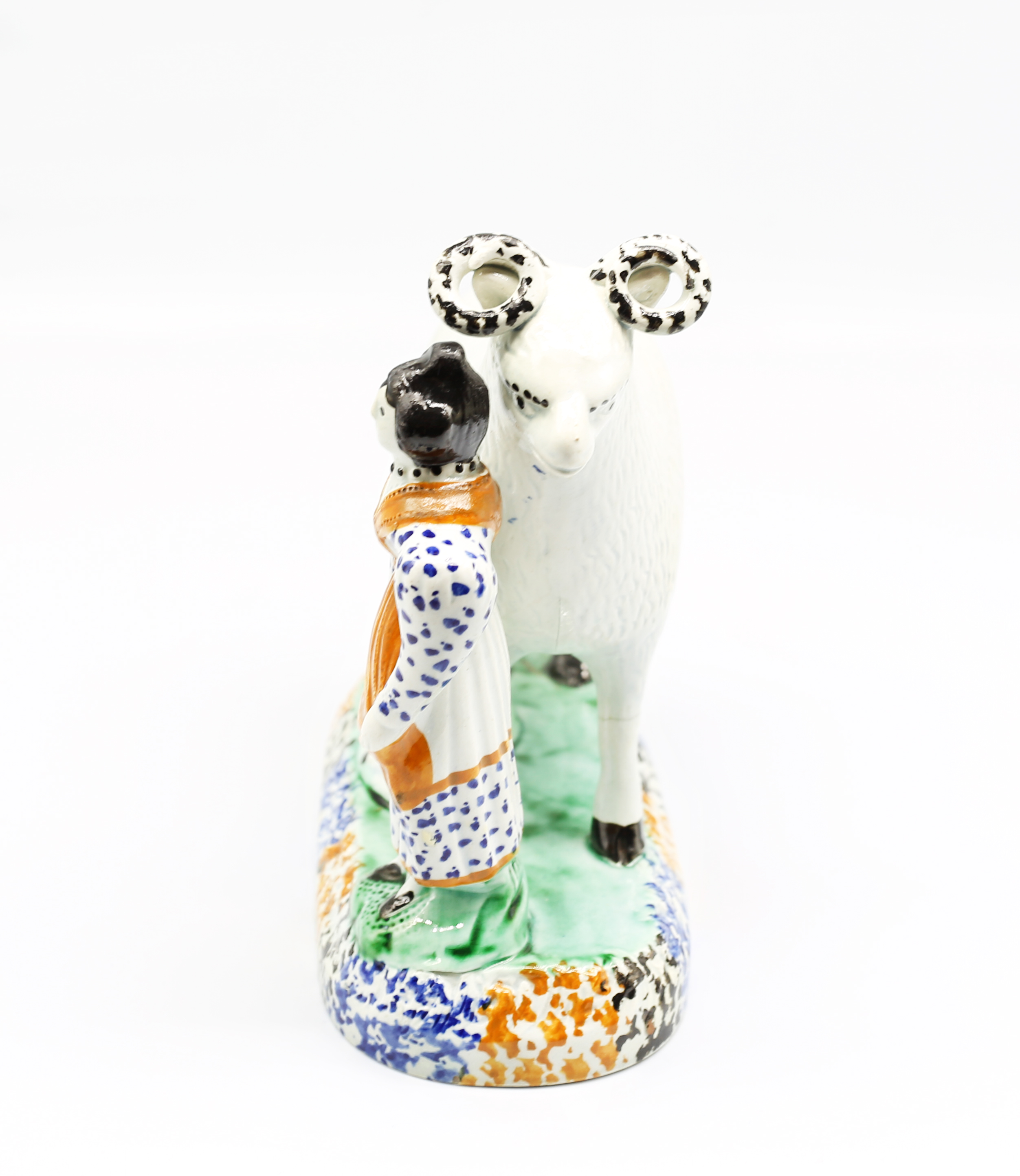 A Prattware model of a sheep and her lambs laying beneath her, with a shepherdess standing to the - Image 4 of 15