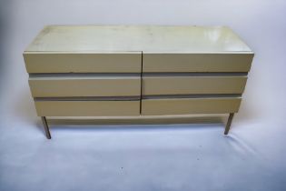 A 1960s Stag Opus 22 white-fronted chest of six drawers on square section aluminium legs, 120 x 60 x