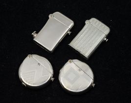 A small collection of four Thorens 1920s Art Deco lighters, two of circular form with engine