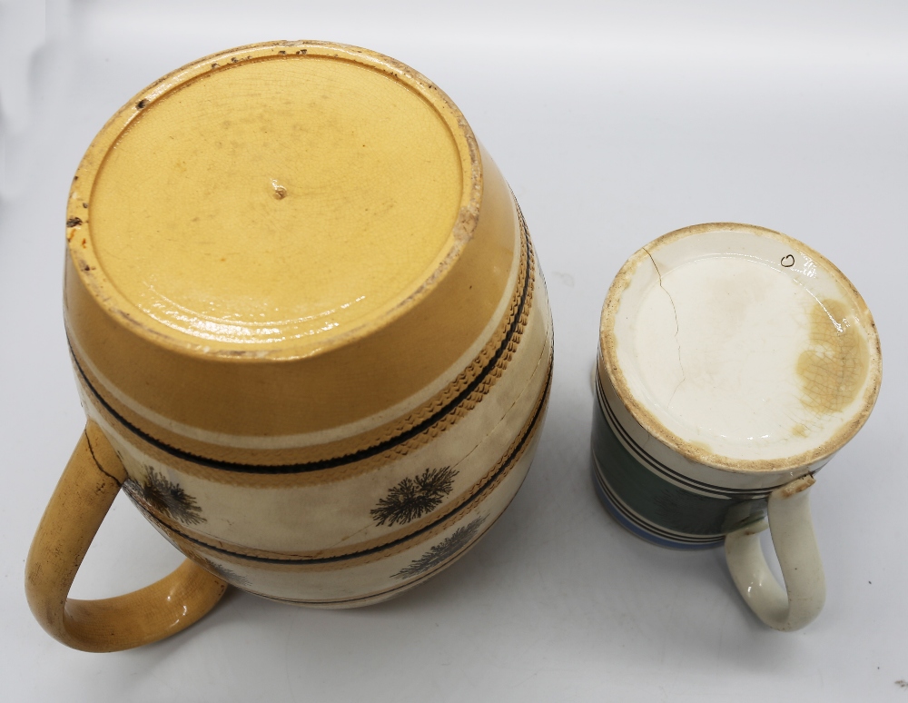 A large mocha ware pitcher, cream ground with ochre and black bands with black trees. C 1810, - Image 5 of 5