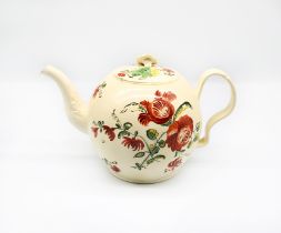 A Staffordshire William Greatbatch /Leeds creamware globular teapot and cover, painted with