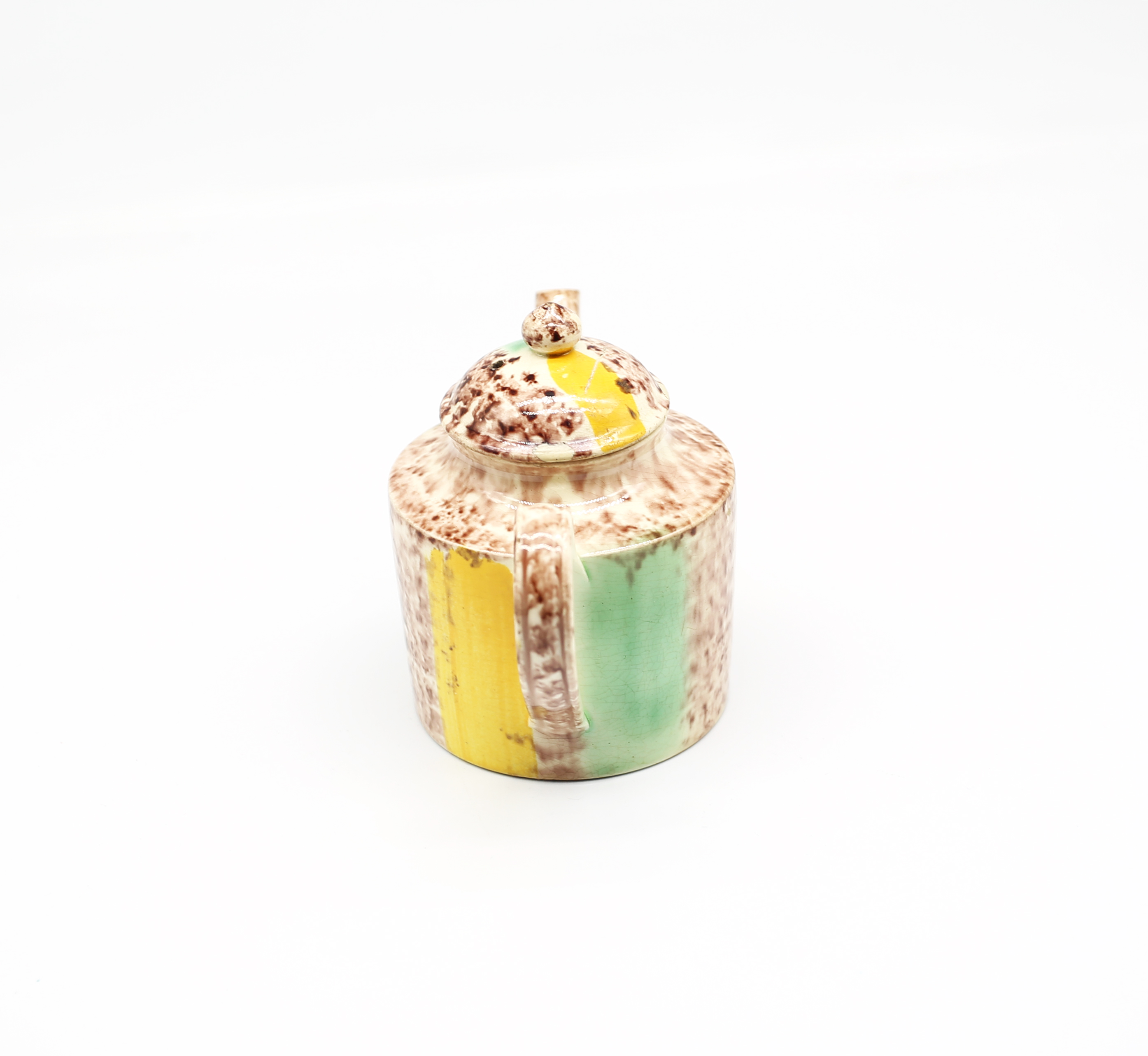 A small cylindrical Whieldon style teapot and cover, sponge decorated in brown, yellow and green - Image 2 of 17