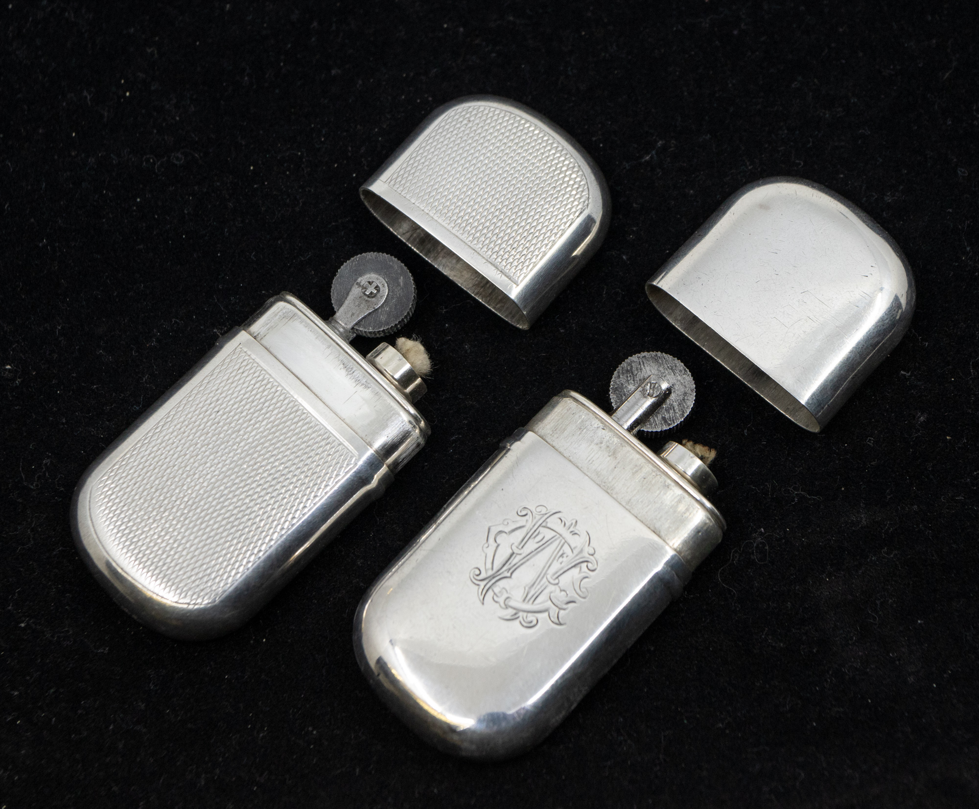 A George V engine turned silver lighter, of oval shape with removable cover, hallmarked by E.S. - Image 3 of 3