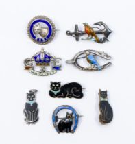 A collection of mixed small silver brooches/pin badges to include; a Charles Horner silver and